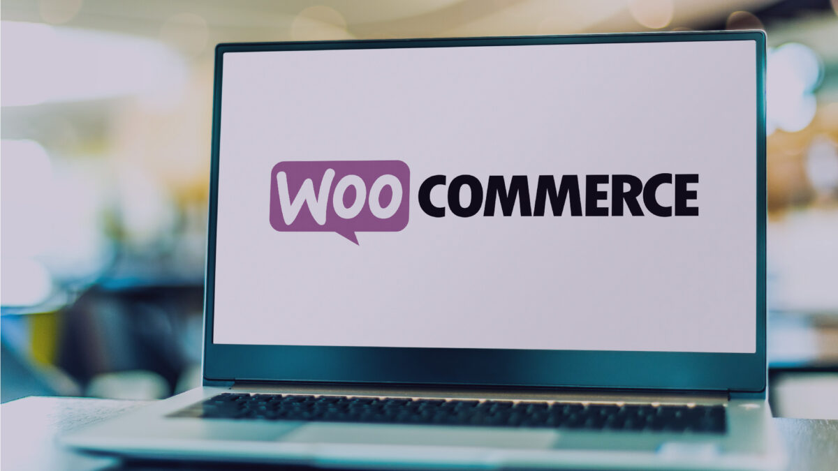 WooCommerce logo displaying on a laptop